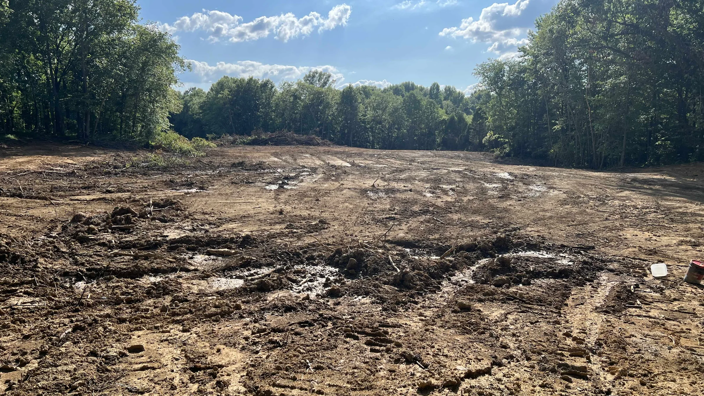 The cleared and graded building site, early 2025